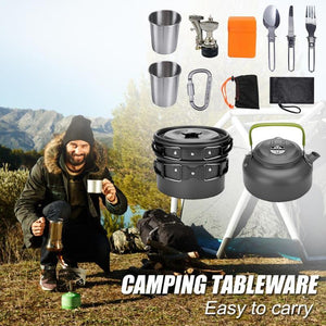 Collection of camping cookware and utensils including pots, kettle, cups, and cutlery on a white background.