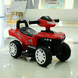 Red and black toy ATV on a shiny floor