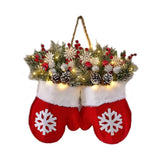 Decorative Christmas stocking with mittens, lights, and festive elements on a white background