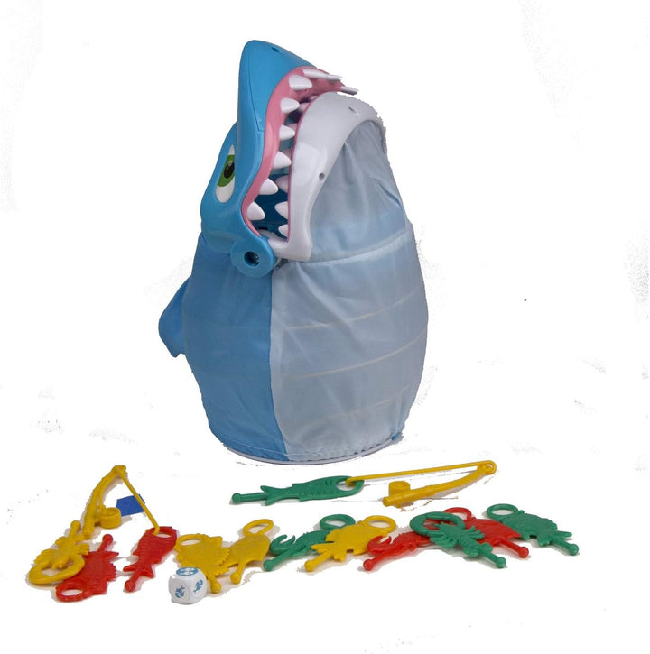 Family game night with Sharkado toy