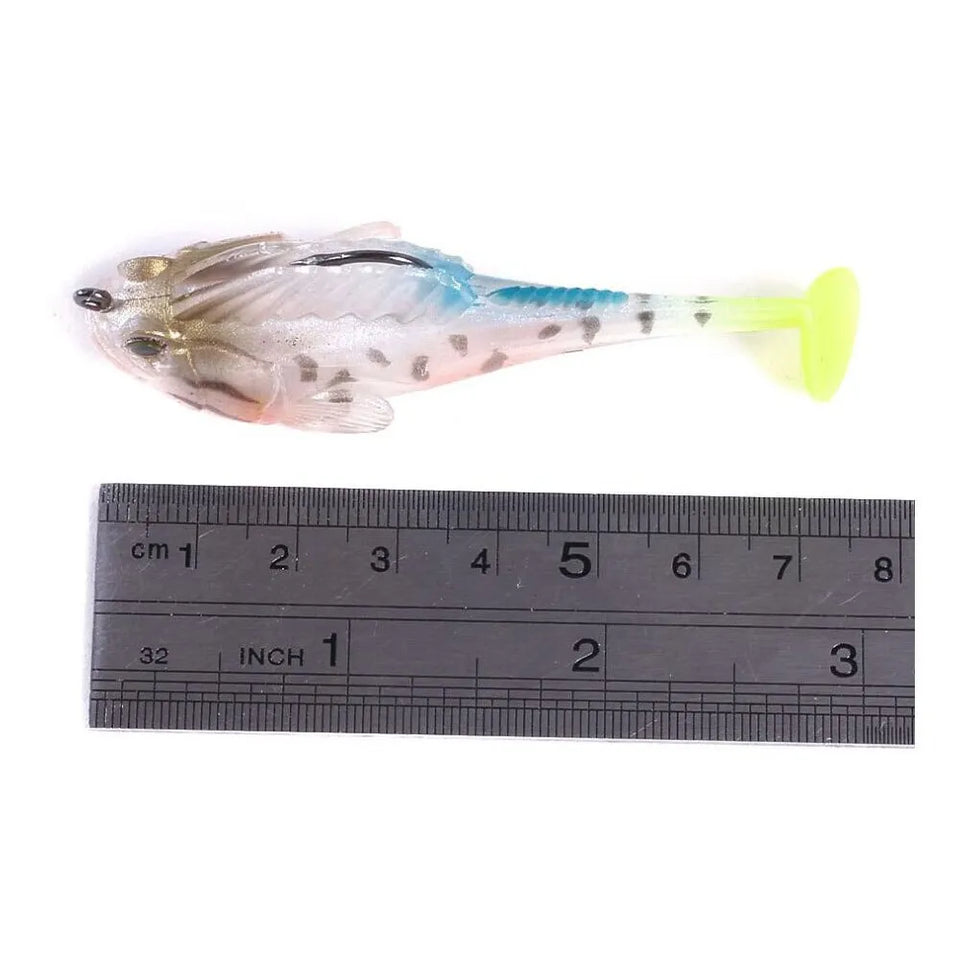 Fishing lure with a ruler for scale on a white background