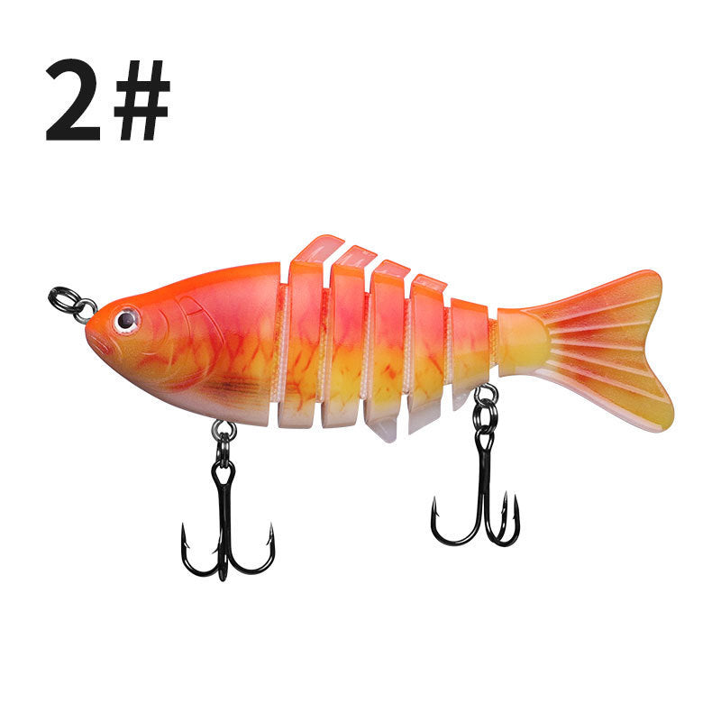 Colorful fishing lure with multiple hooks on a white background