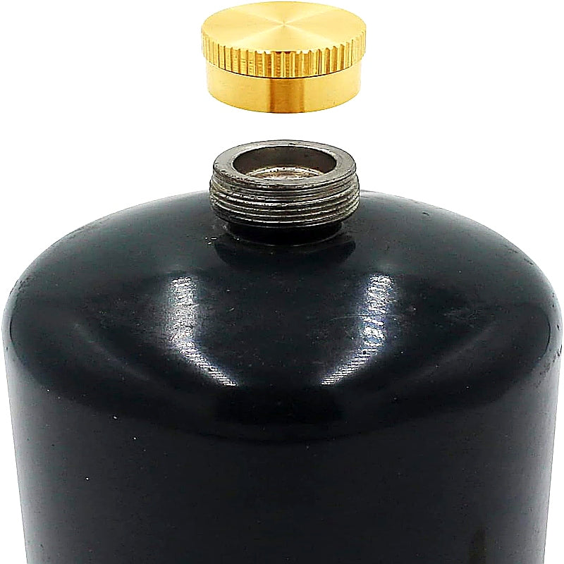 Black cylindrical container with a gold cap on a white background